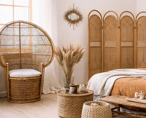 A cozy bedroom featuring natural decor elements, including a large bed with neutral bedding, wooden furniture, and lush green plants, creating a warm and inviting atmosphere.